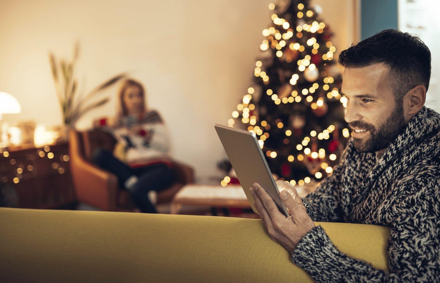 man looking at top Black Friday 2023 items